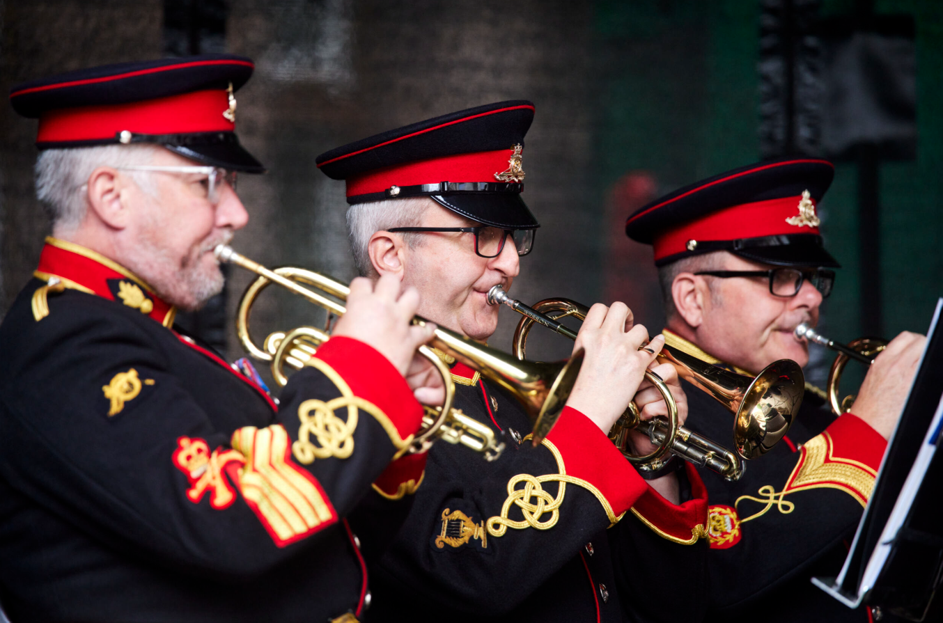 Photo of army veterans playing trumpets