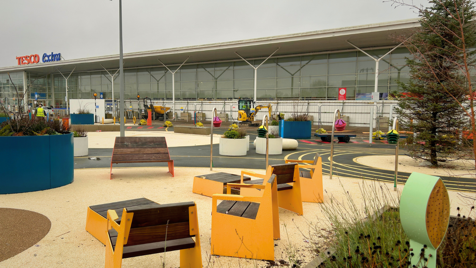 View of the new Gorton town square with diggers in the background