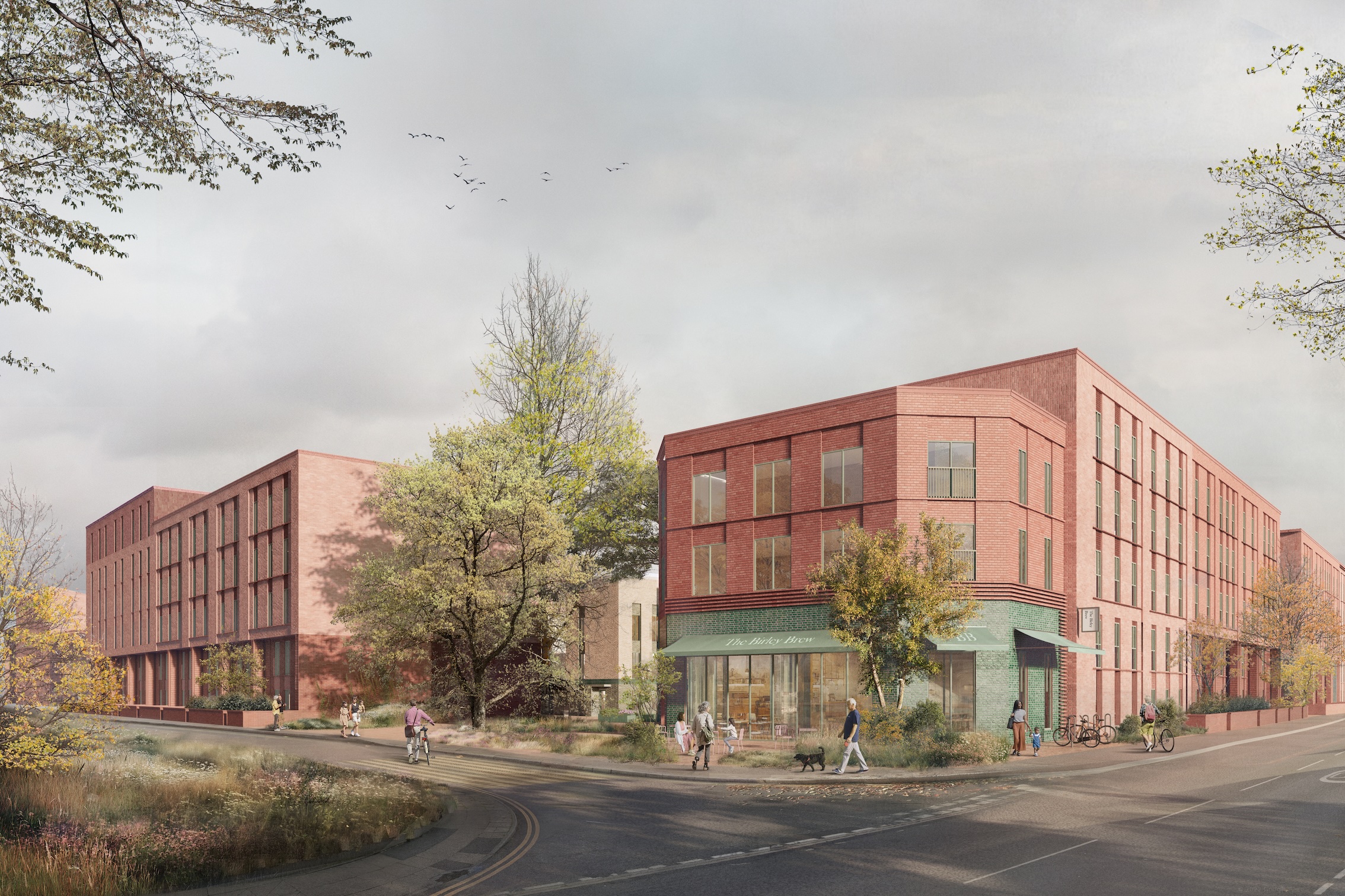 Indicative image of the Birley Fields developmen including red brick apartment blocks surrounded by trees