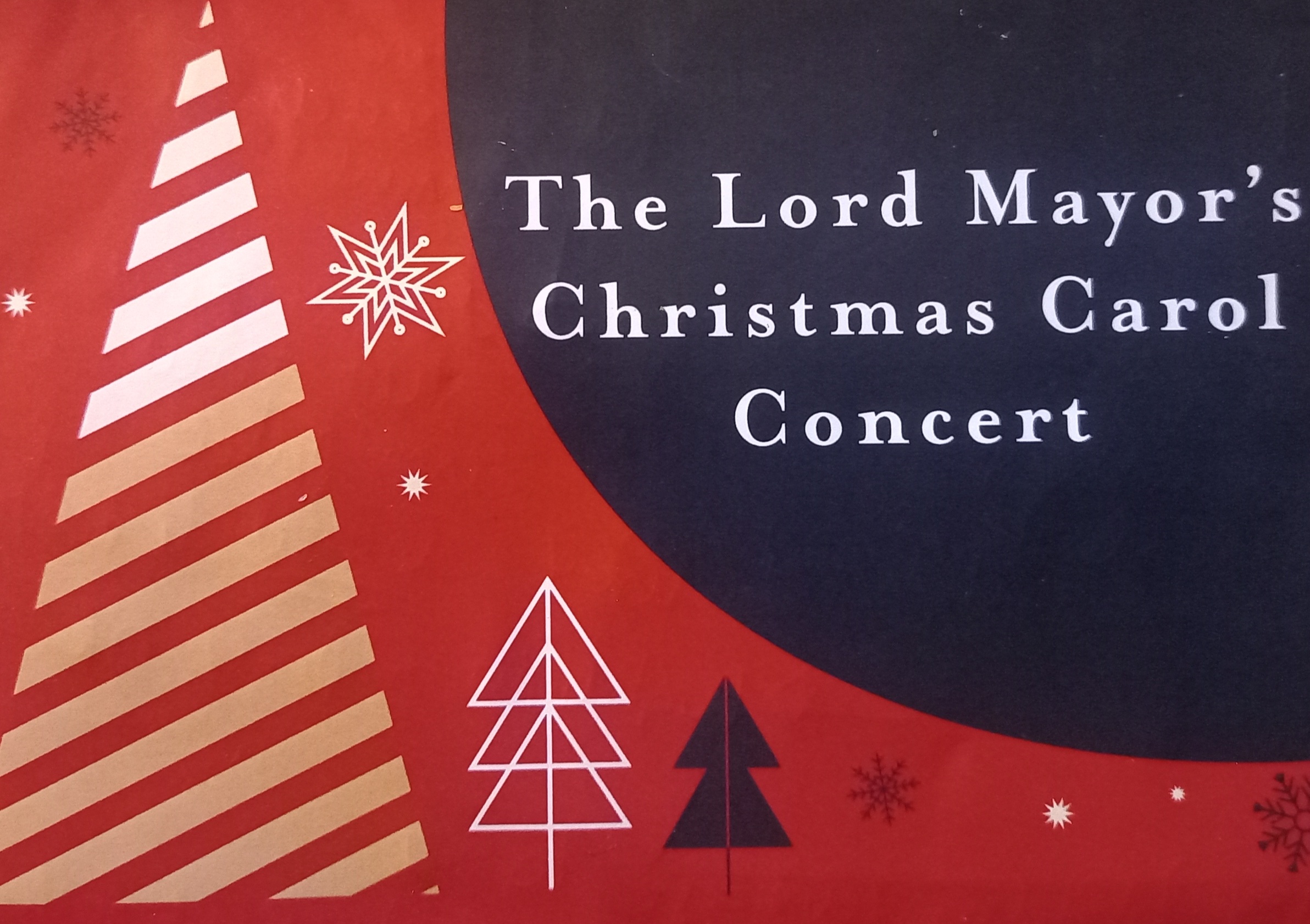 The words The Lord Mayor's Christmas Carol Concert are written against a blue and red background with christmas tree shapes on it