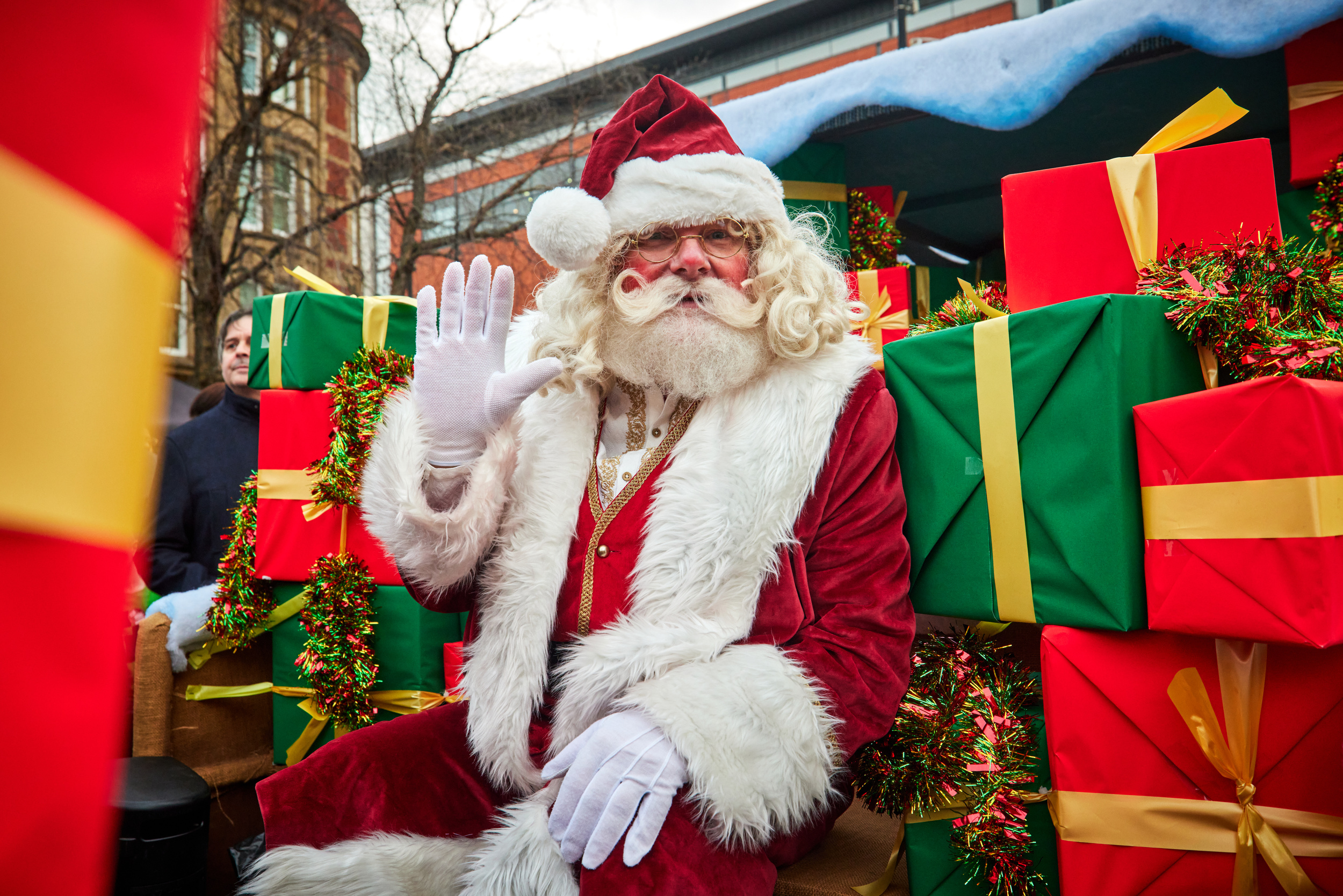 Father Christmas waving at the camera