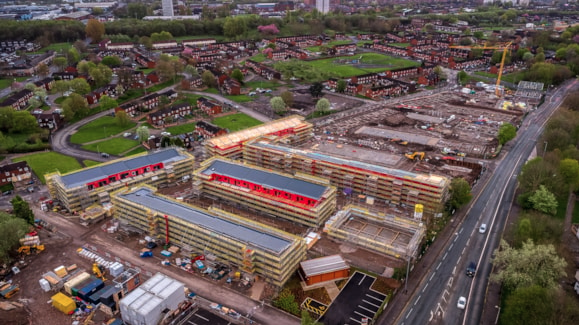 Collyhurst Village development from the air showing 244 new homes being built
