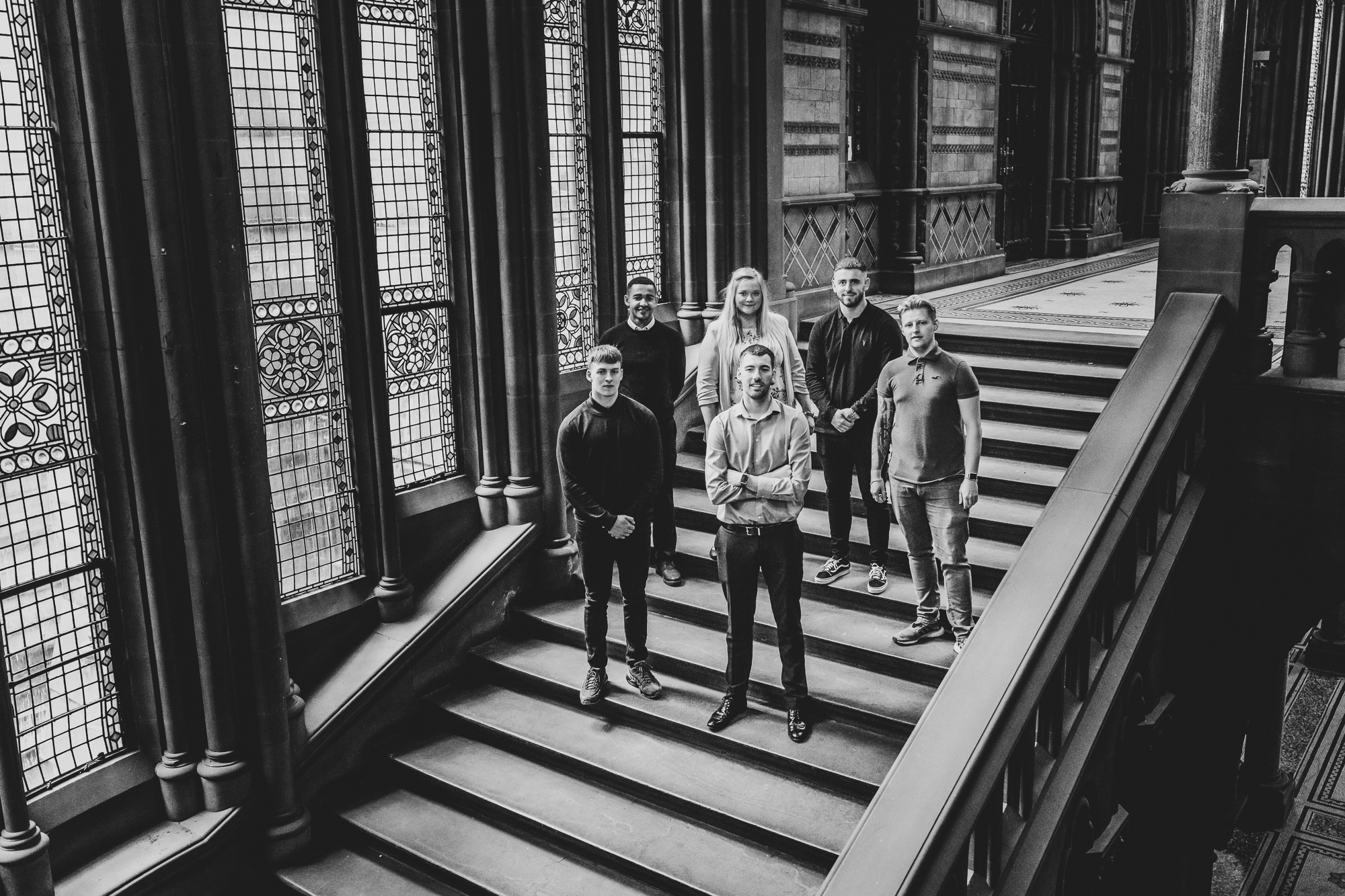 Image shows the group of apprentices on the main staircase in the Town Hall 