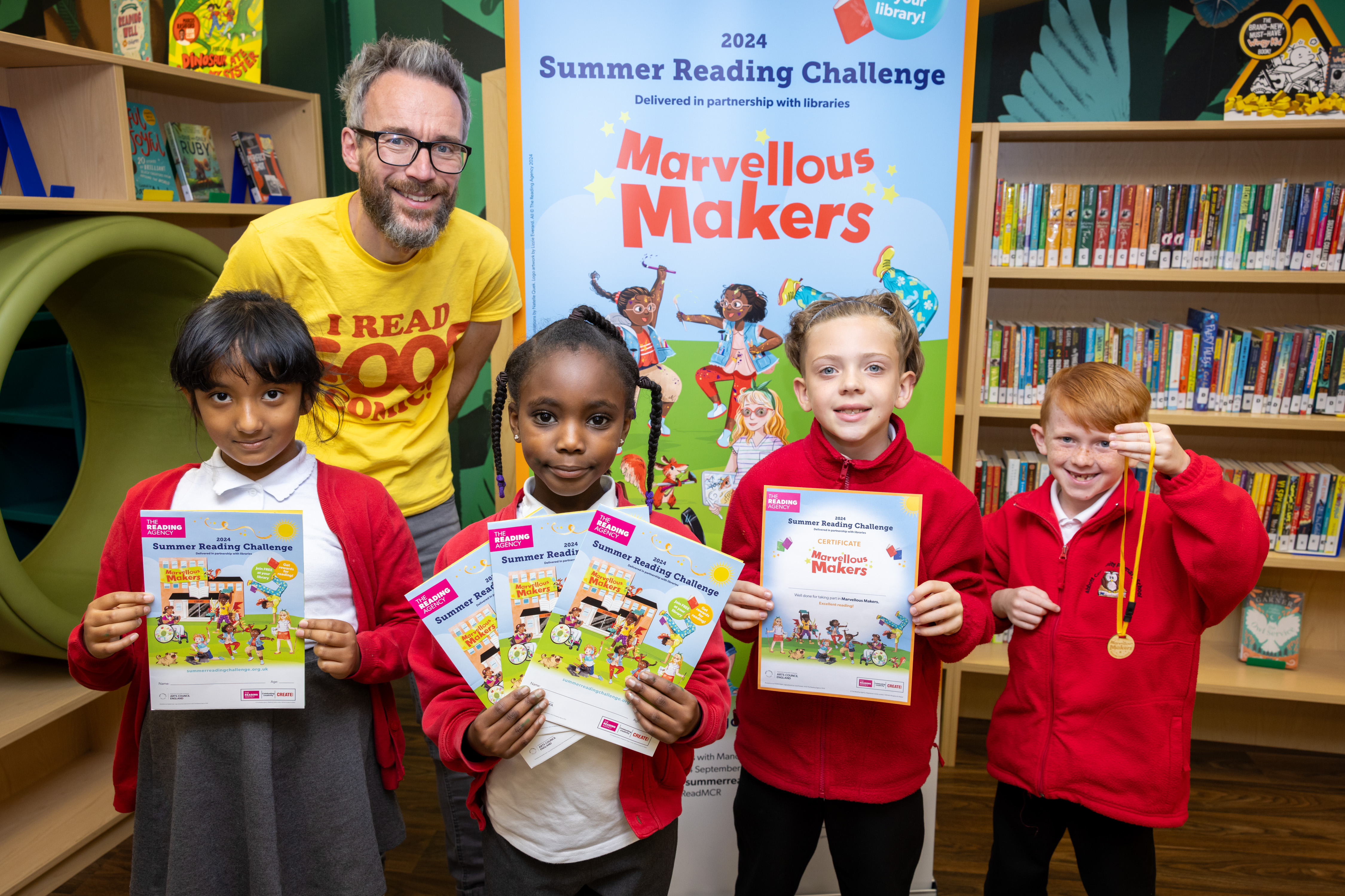 Author takes a photograph with children