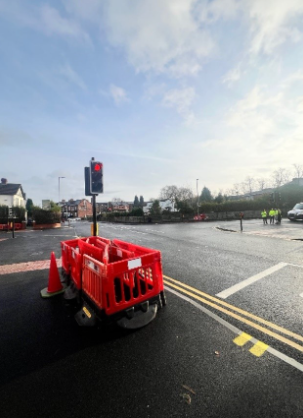 Image showing tactile surface paving and traffic lights at a controlled pedestrian crossing at the junction of Slade Lane / Moseley Road / Albert Road