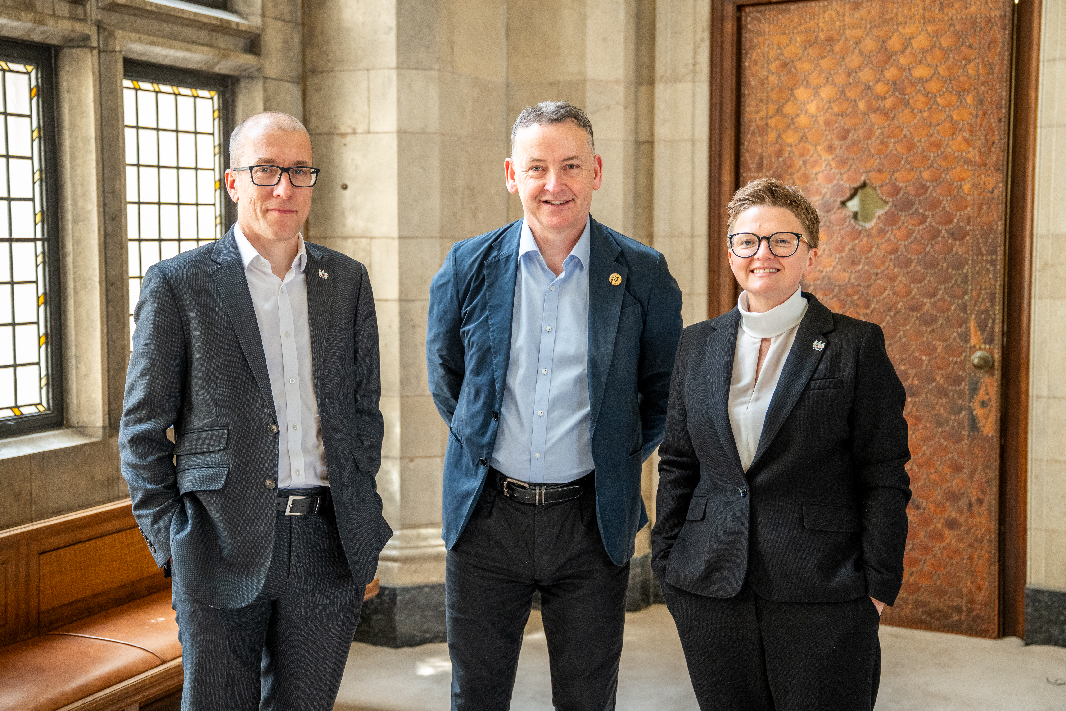 Image (L-R) MCC chief executive Tom Stannard, Strategic Director of Children's Services and Education Sean McKendrick, Leader of Manchester City Council Cllr Bev Craig.