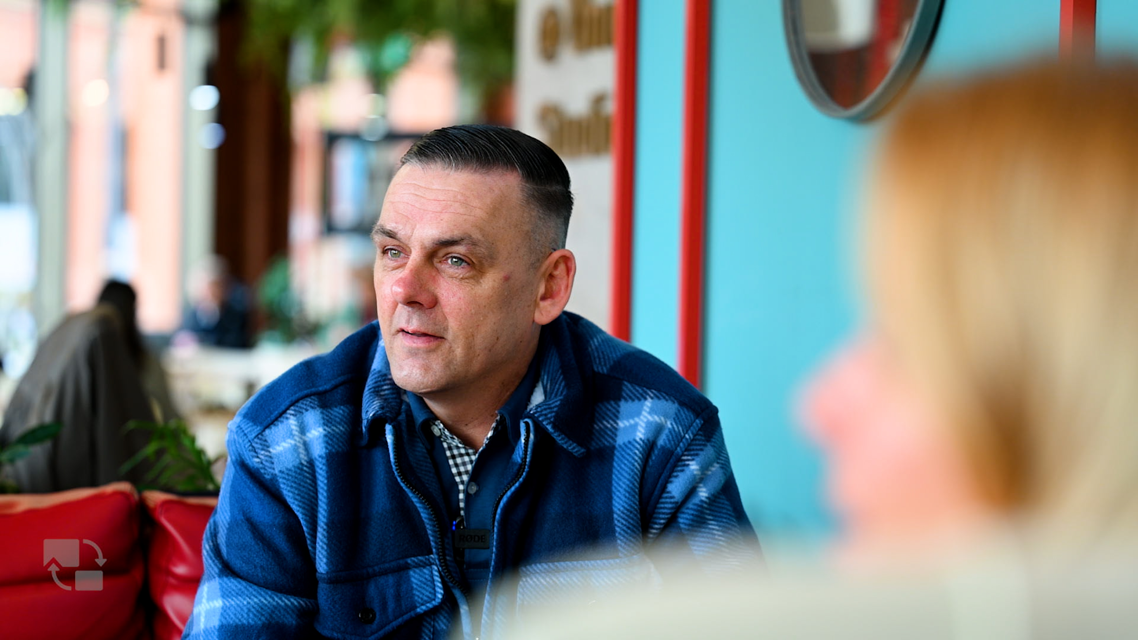 Photo of Rob Jones sitting in a cafe