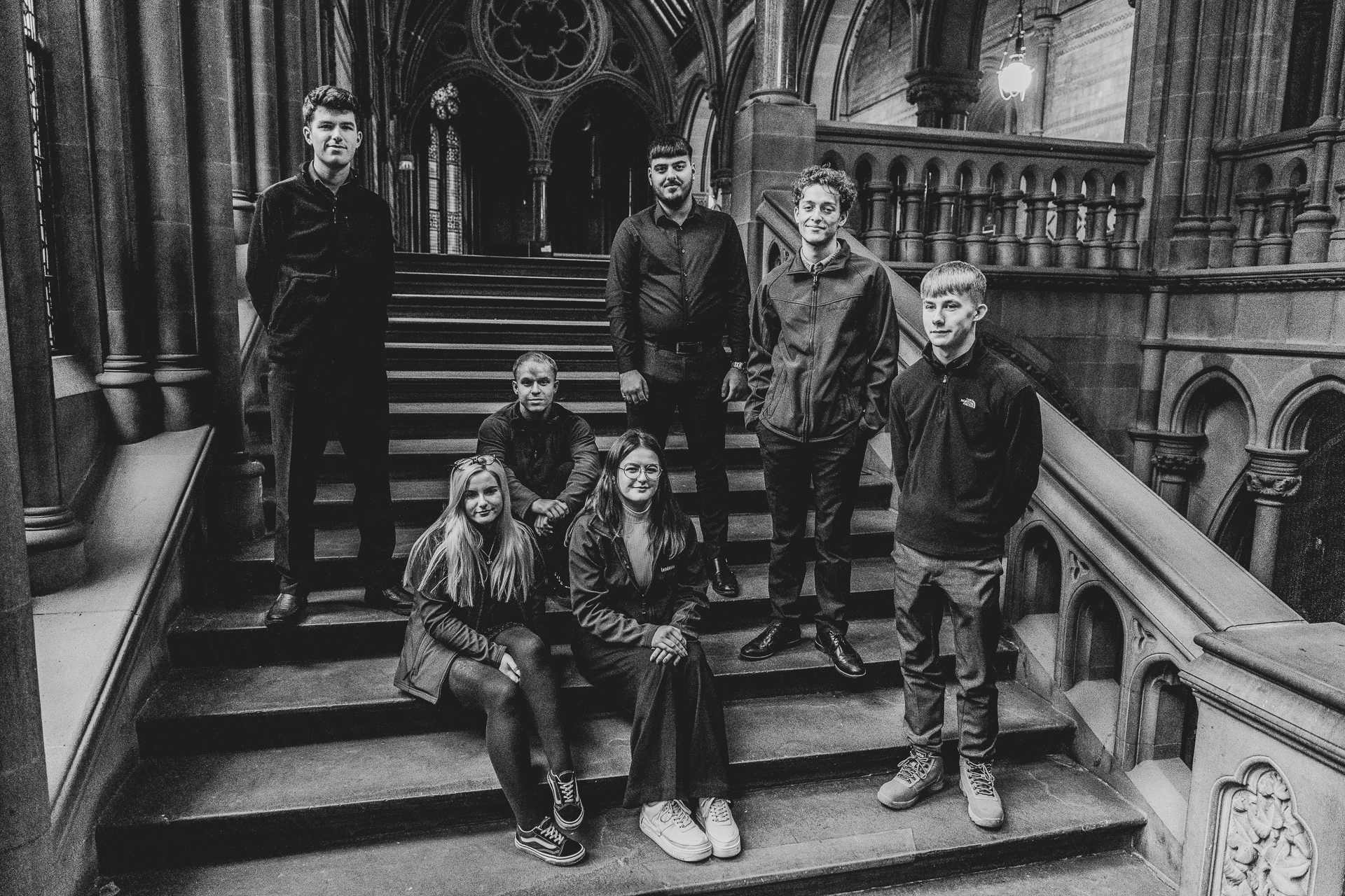 Image shows the group of apprentices from 2019 on the main staircase of the Town Hall 