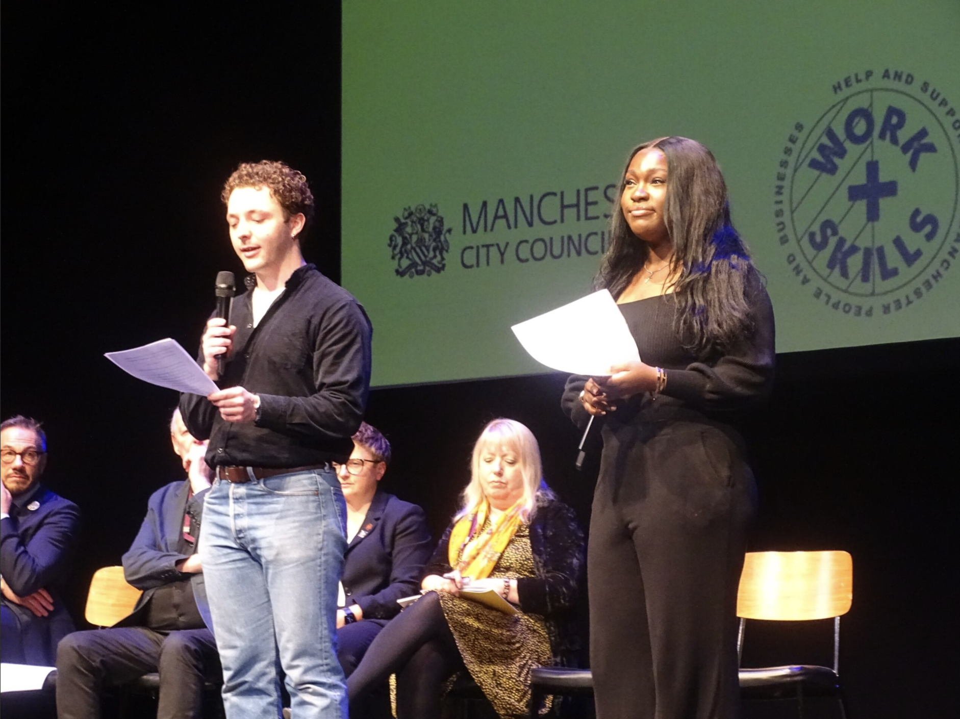 Two participants standing on stage at the recent launch of the BREE programme.