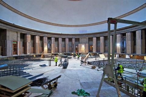 Builders working in the Central Library reading room during the transformation project.