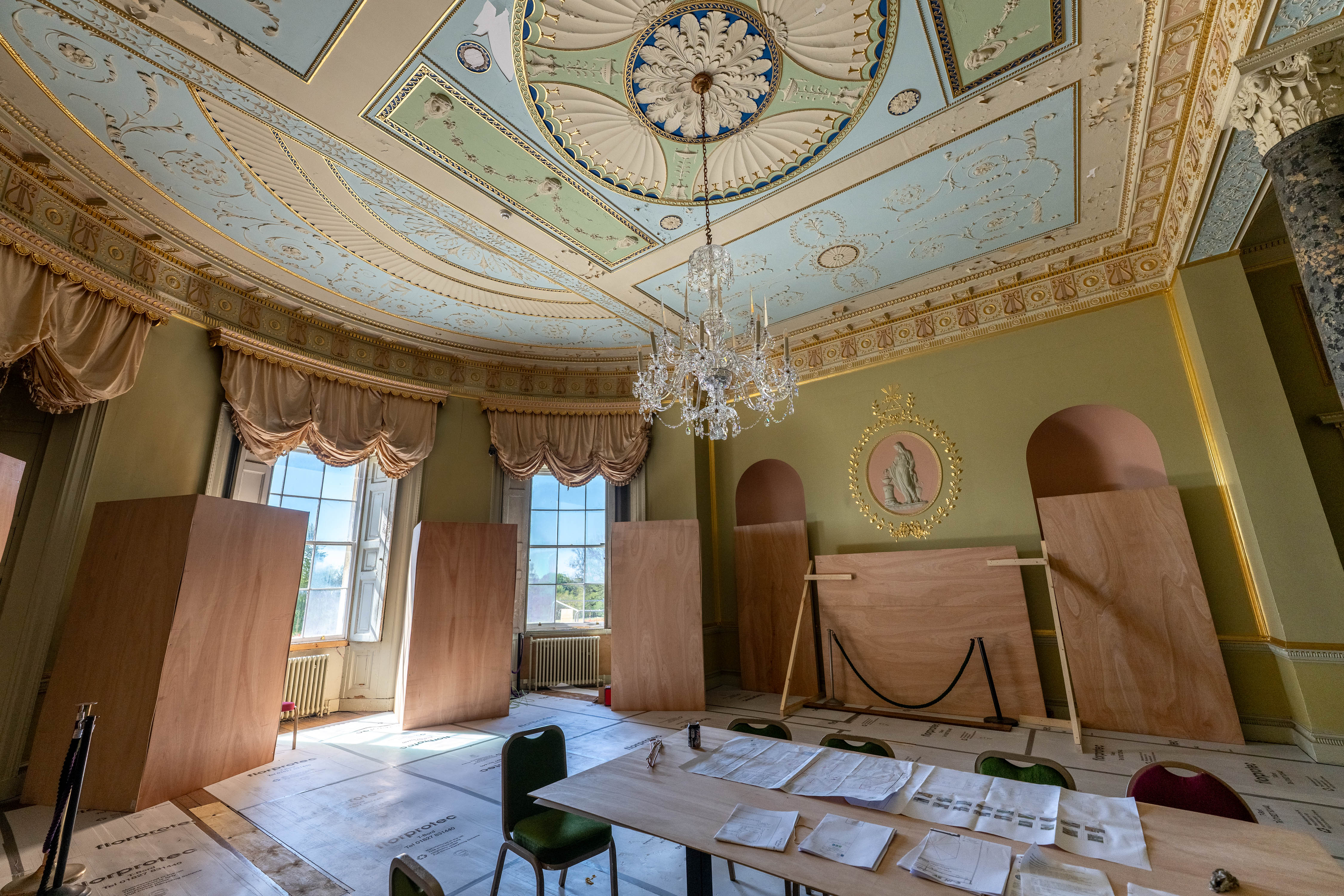 Image of a refurbished chandelier in Heaton hall's music room