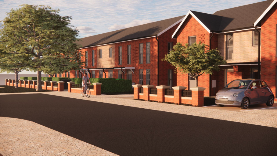 Computer generated image of what the new homes in Moston will look like - red brick family homes