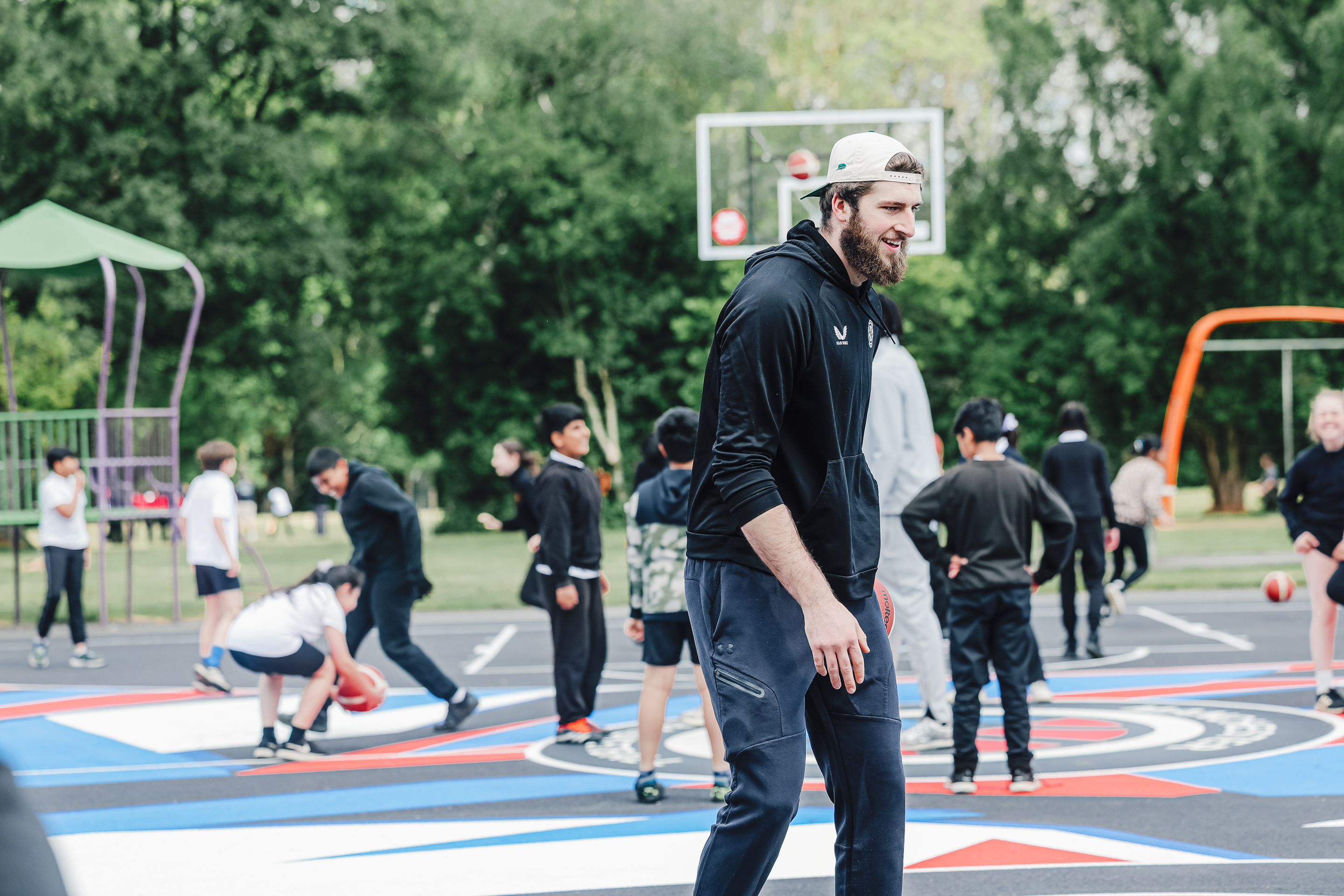 YOung people using the new courts at Cringle Park